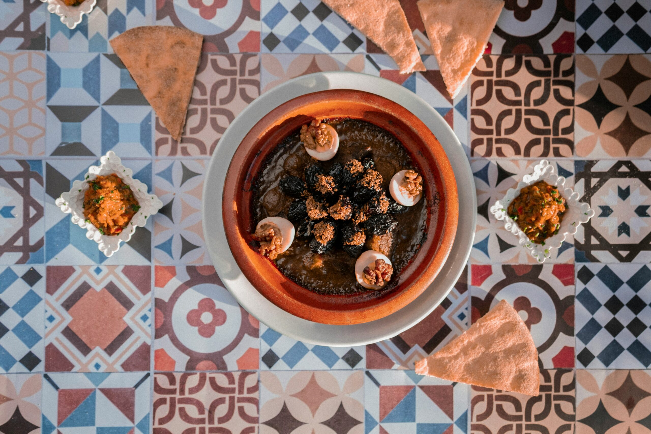 discover the rich flavors of traditional moroccan tajine. this slow-cooked dish combines tender meats, aromatic spices, and fresh vegetables, creating a delightful and authentic culinary experience. perfect for enticing food lovers and adventurous cooks alike